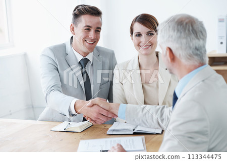 Shaking hands, happy business people or deal for partnership agreement or b2b offer in meeting. Handshake, smile or excited corporate lawyers in collaboration for teamwork with contract or paperwork Shaking hands, happy business people or deal for partnership agreement or b2b offer in meeting. Handshake, smile or excited corporate lawyers in collaboration for teamwork with contract or paperwork 113344475