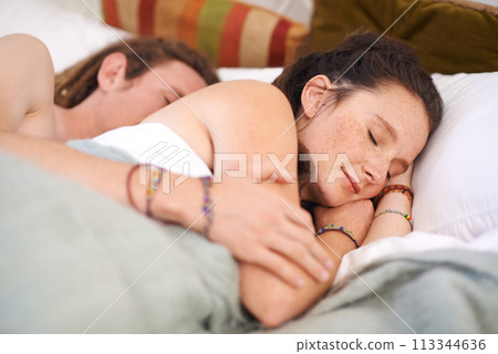 Sleeping, couple and hug in bedroom in home for peace, calm or relax to dream together in the morning. Man, woman and cuddle to rest in bed for connection, comfort and embrace for love in apartment Sleeping, couple and hug in bedroom in home for peace, calm or relax to dream together in the morning. Man, woman and cuddle to rest in bed for connection, comfort and embrace for love in apartment 113344636