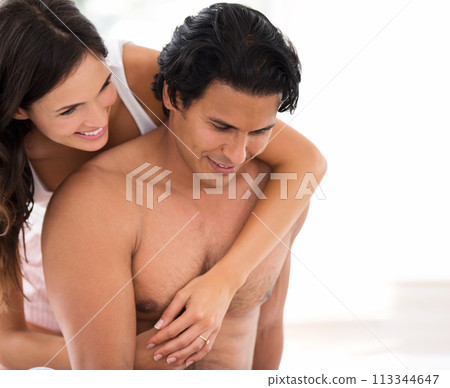 Love, smile and couple hug in bedroom for care, bonding and connection together in home. Happy man, woman and people embrace for commitment, support and trust for healthy relationship on mockup space 113344647