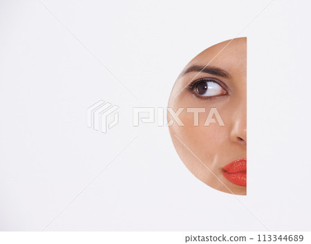 Woman, thinking and beauty in a cutout and studio for cosmetics, skincare and dermatology. Young model with makeup, foundation and art deco with ideas, closeup and mockup space on a white background 113344689