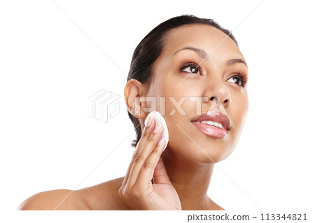 Skincare, makeup removal and woman with cotton pad for dermatology, wellness or healthy facial skin with white background. Beauty, hand and female model for toner, application and cleansing in studio Skincare, makeup removal and woman with cotton pad for dermatology, wellness or healthy facial skin with white background. Beauty, hand and female model for toner, application and cleansing in studio 113344821