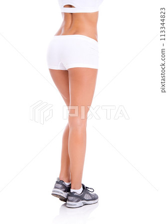 Body, back and legs of person in sportswear, training and sports isolated on a white studio background mockup space. Butt, workout and model exercise for health, wellness or fitness with rear view Body, back and legs of person in sportswear, training and sports isolated on a white studio background mockup space. Butt, workout and model exercise for health, wellness or fitness with rear view 113344823