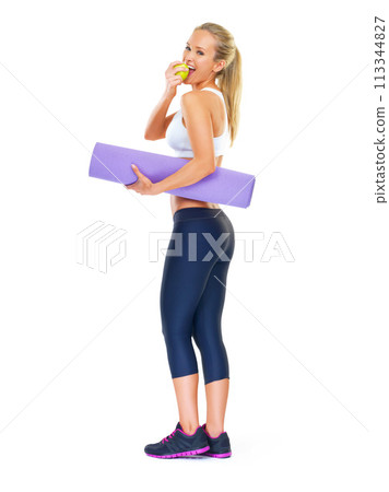 Portrait, woman or apple as nutrition, yoga or mat as fitness, energy or health in studio mockup. Female yogi, fruit or sportswear in happy, body or training by workout, healthy or organic vegan diet 113344827