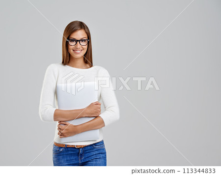 Portrait, happy woman and student with laptop in studio isolated on a white background mockup space. Glasses, computer and person in casual clothes with tech for internet, email or learning in Italy 113344833