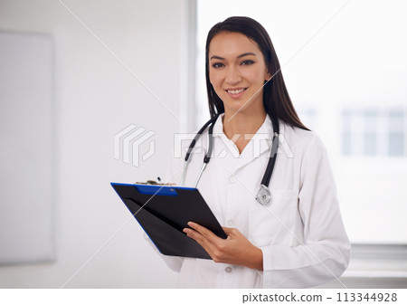 Portrait, happy doctor and woman writing on checklist in hospital for healthcare, wellness and notes in Brazil. Face, medical professional and employee with clipboard, worker and smile of expert Portrait, happy doctor and woman writing on checklist in hospital for healthcare, wellness and notes in Brazil. Face, medical professional and employee with clipboard, worker and smile of expert 113344928