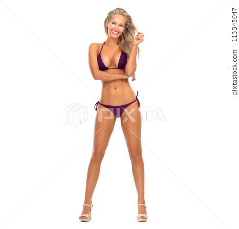 Fashion, studio and female person in swimwear, pose and portrait in swimming bikini on white background. Confidence, body and happiness with pride for fit woman model, smile or swimsuit for summer Fashion, studio and female person in swimwear, pose and portrait in swimming bikini on white background. Confidence, body and happiness with pride for fit woman model, smile or swimsuit for summer 113345047