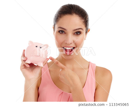 Portrait, woman and pointing at piggy bank in studio for budget, finance or investment. Face, excited or person with money box for savings, income or security of profit isolated on a white background Portrait, woman and pointing at piggy bank in studio for budget, finance or investment. Face, excited or person with money box for savings, income or security of profit isolated on a white background 113345065