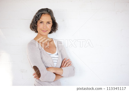Mature woman, portrait and confidence in studio with background for positivity, smile and style. Confident, happy and face of senior female person with pride for fashion, optimist and retirement Mature woman, portrait and confidence in studio with background for positivity, smile and style. Confident, happy and face of senior female person with pride for fashion, optimist and retirement 113345117