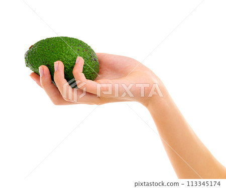 Nutrition, avocado and hand in studio for healthy diet, wellness and vitamin c on white background. Fruit, green and holding for delicious ingredients, organic food and vegetarian meal with mockup 113345174