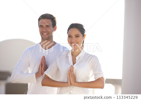 Smile, prayer pose and couple at yoga retreat with peace, relax and calm mindfulness at outdoor resort. Zen, man and happy woman together in holistic health, spiritual wellness and namaste with hands 113345229