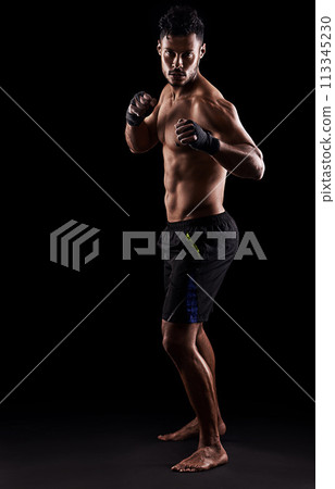 Man, boxer and portrait in studio for sports, fitness and warrior training on black background. Person, athlete and strong muscles for workout or exercise, health and ready for battle or competition 113345230