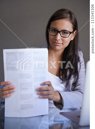 Paperwork, document and portrait of woman at desk in office with legal report of compliance. Professional, attorney and notary with contract proposal on table with information for deal in business Paperwork, document and portrait of woman at desk in office with legal report of compliance. Professional, attorney and notary with contract proposal on table with information for deal in business 113345306