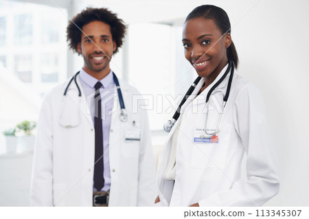 Portrait, healthcare and doctor team with stethoscope, smile and wellness in hospital. Medical, expert or professional teamwork at clinic or support facility, confident or happy employees in medicine 113345307