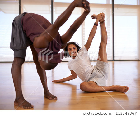 Dancer, men and stretching with happy in class for warm up, fitness or muscle in portrait on floor. People, team and support for dancing, workout and legs to start creativity in studio for exercise Dancer, men and stretching with happy in class for warm up, fitness or muscle in portrait on floor. People, team and support for dancing, workout and legs to start creativity in studio for exercise 113345367