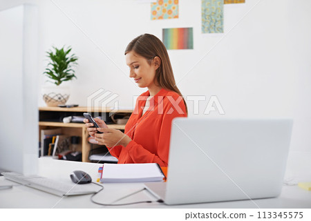 Woman, cellphone and chat at desk for communication, social media and browsing on break at startup. Reading email, contact and using phone for mobile app, connectivity and network at the office Woman, cellphone and chat at desk for communication, social media and browsing on break at startup. Reading email, contact and using phone for mobile app, connectivity and network at the office 113345575