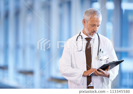 Checklist, serious doctor and man reading in hospital for healthcare, wellness and notes. Clipboard, medical professional and mature surgeon with paperwork, results and report on chart in clinic Checklist, serious doctor and man reading in hospital for healthcare, wellness and notes. Clipboard, medical professional and mature surgeon with paperwork, results and report on chart in clinic 113345580