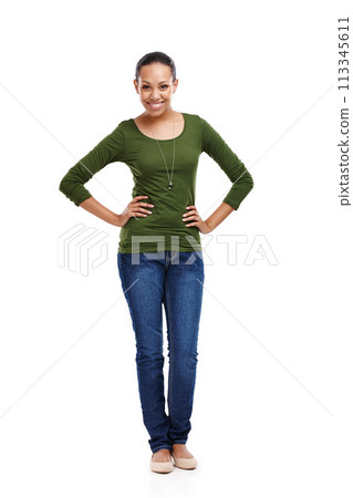 Woman, happy and hands on hips in isolated, portrait and white background or studio. Female person, smile and confident in backdrop for fashion, style and outfit with pride, clothing and beauty 113345611