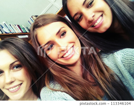 Student, selfie and girls with friends smile, happy and fun for social media upload post with group. University, college and educational leaners in library, carefree together for study session break 113346104