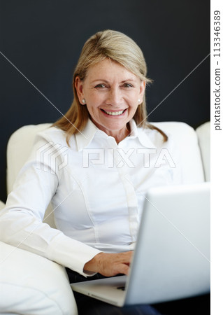 Mature businesswoman, portrait and laptop on couch, planning and internet for b2b online communication. Female person, CEO and proud of startup company, finance and happy accountant for ideas on web Mature businesswoman, portrait and laptop on couch, planning and internet for b2b online communication. Female person, CEO and proud of startup company, finance and happy accountant for ideas on web 113346389