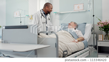 Consultation, medical and doctor with patient in hospital after surgery, treatment or procedure. Discussion, checkup and African male healthcare worker talk to senior man in clinic bed for diagnosis. 113346420