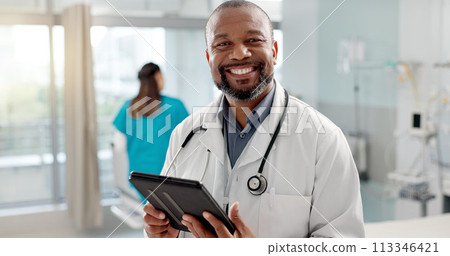 Hospital, face and black man with a tablet, doctor and typing with website info, internet and consultant. African person, portrait and medical professional with tech, clinic and research with email 113346421