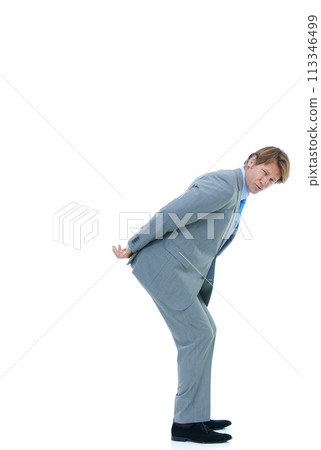 Businessman, portrait and back with pressure, workload or carrying invisible weight on a white studio background. Isolated man, employee or model holding something heavy for business on mockup space Businessman, portrait and back with pressure, workload or carrying invisible weight on a white studio background. Isolated man, employee or model holding something heavy for business on mockup space 113346499