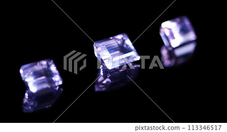 Rock, jewel and amethyst in studio with black background for natural resource, baguette and sparkle for luxury. Gemstone, purple crystal and reflection in closeup for shine, glow and mineral 113346517