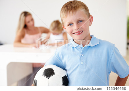 Boy, football and smiling in portrait at home for after school summer sports, training and playing with friends. Child, happy and excited for fitness exercise, soccer practice or fun workout Boy, football and smiling in portrait at home for after school summer sports, training and playing with friends. Child, happy and excited for fitness exercise, soccer practice or fun workout 113346668