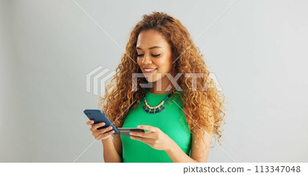 Happy woman, phone and banking with credit card for payment or online shopping on a gray studio background. Female person or shopper with smile on mobile smartphone for ecommerce on mockup space Happy woman, phone and banking with credit card for payment or online shopping on a gray studio background. Female person or shopper with smile on mobile smartphone for ecommerce on mockup space 113347048