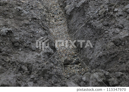 Underdrain perforated drainage pipe installation work Underdrain perforated drainage pipe installation work 113347970