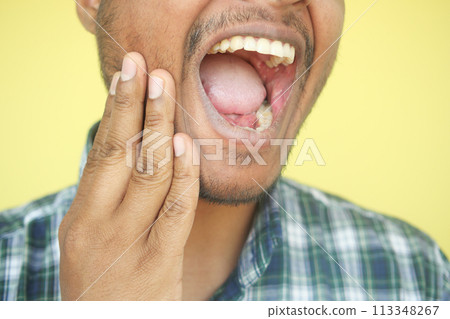 young man with sensitive teeth young man with sensitive teeth 113348267