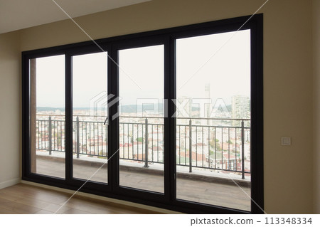 Modern building with tinted windows. Urban architecture Modern building with tinted windows. Urban architecture 113348334
