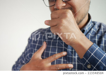 Sick man got flu allergy sneezing and blowing nose 113348584