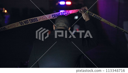 Police officer, man and yellow tape for crime scene, investigation or back in night, warning and danger sign. Forensic inspection, person or detective with security for robbery, murder and no entry Police officer, man and yellow tape for crime scene, investigation or back in night, warning and danger sign. Forensic inspection, person or detective with security for robbery, murder and no entry 113348716