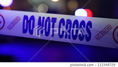 Police, sirens and yellow tape for crime scene, investigation and barricade in night for warning, danger or sign. Forensic inspection, street or road with security for robbery, murder and no entry Police, sirens and yellow tape for crime scene, investigation and barricade in night for warning, danger or sign. Forensic inspection, street or road with security for robbery, murder and no entry 113348729