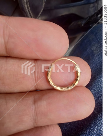 hand with handcuffs 113350594