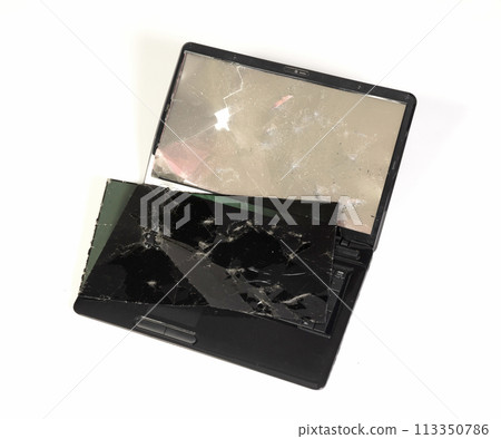 Old broken laptop isolated on white background 113350786