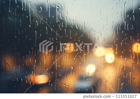Golden Rain: Twilight City through a Rain-Streaked Window 113351027