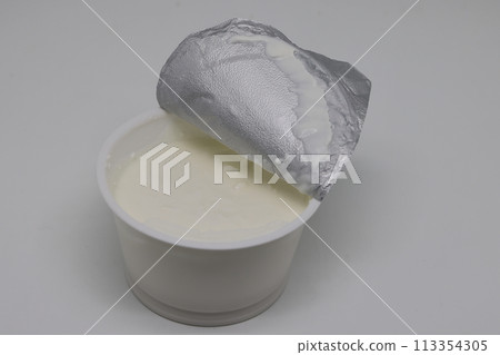 Prepackaged sour cream mayonnaise in a plastic bucket. Ready to eat. 113354305