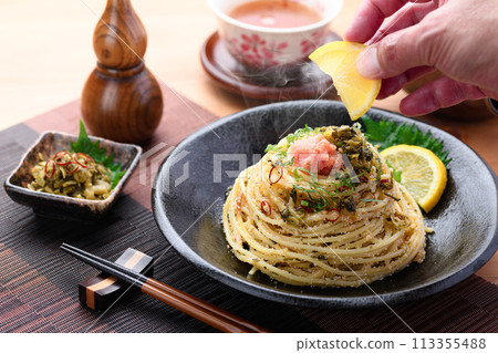 Japanese-style pasta with mustard greens and cod roe 113355488
