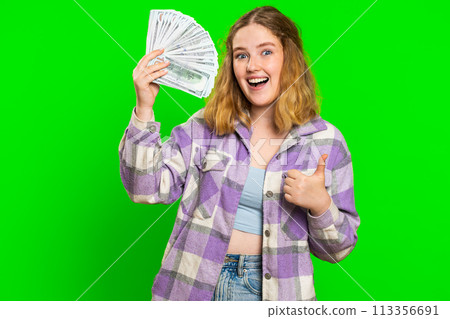 Rich happy woman winner waving money dollar cash like a fan, big income wealth success business Rich happy woman winner waving money dollar cash like a fan, big income wealth success business 113356691