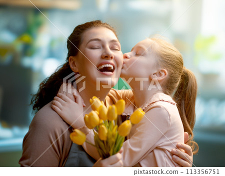 daughter and mom with flowers daughter and mom with flowers 113356751