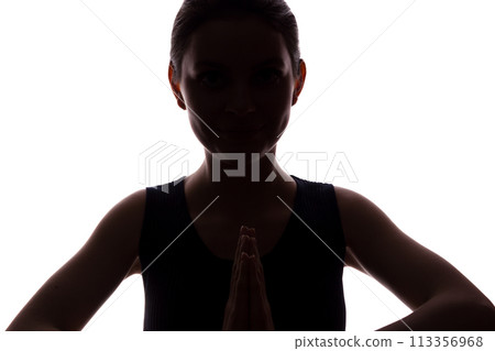 Young woman looking with hope and request - front view Young woman looking with hope and request - front view 113356968
