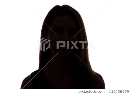 Young woman look ahead with flowing hair - isolated silhouette of a front view Young woman look ahead with flowing hair - isolated silhouette of a front view 113356979