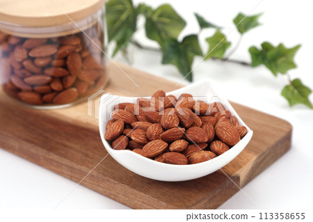 Almonds on a plate Almonds on a plate 113358655