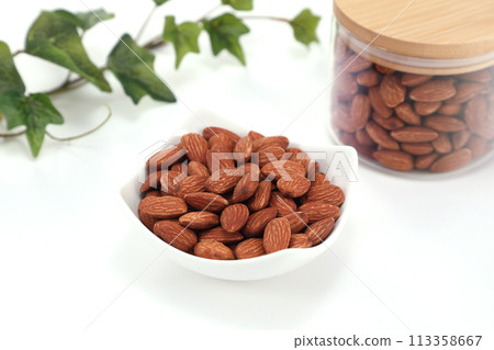 Almonds on a plate Almonds on a plate 113358667