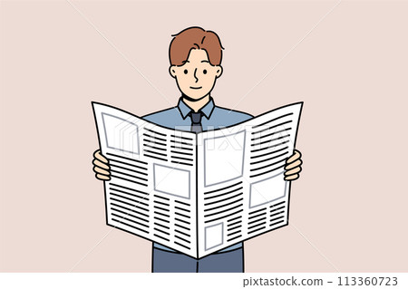 Man reads business newspaper to learn about news from large corporations or looks for job ads Man reads business newspaper to learn about news from large corporations or looks for job ads 113360723
