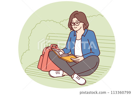 Teenage girl is reading book sitting on park bench enjoying good summer weather and intriguing plot Teenage girl is reading book sitting on park bench enjoying good summer weather and intriguing plot 113360799