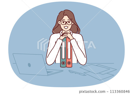 Business woman sits at table leaning on folders and smiling ejoicing at success in career as clerk 113360846