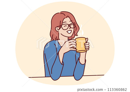 Joyful woman holding coffee mug sitting at table and smiling remembering happy moments from life Joyful woman holding coffee mug sitting at table and smiling remembering happy moments from life 113360862
